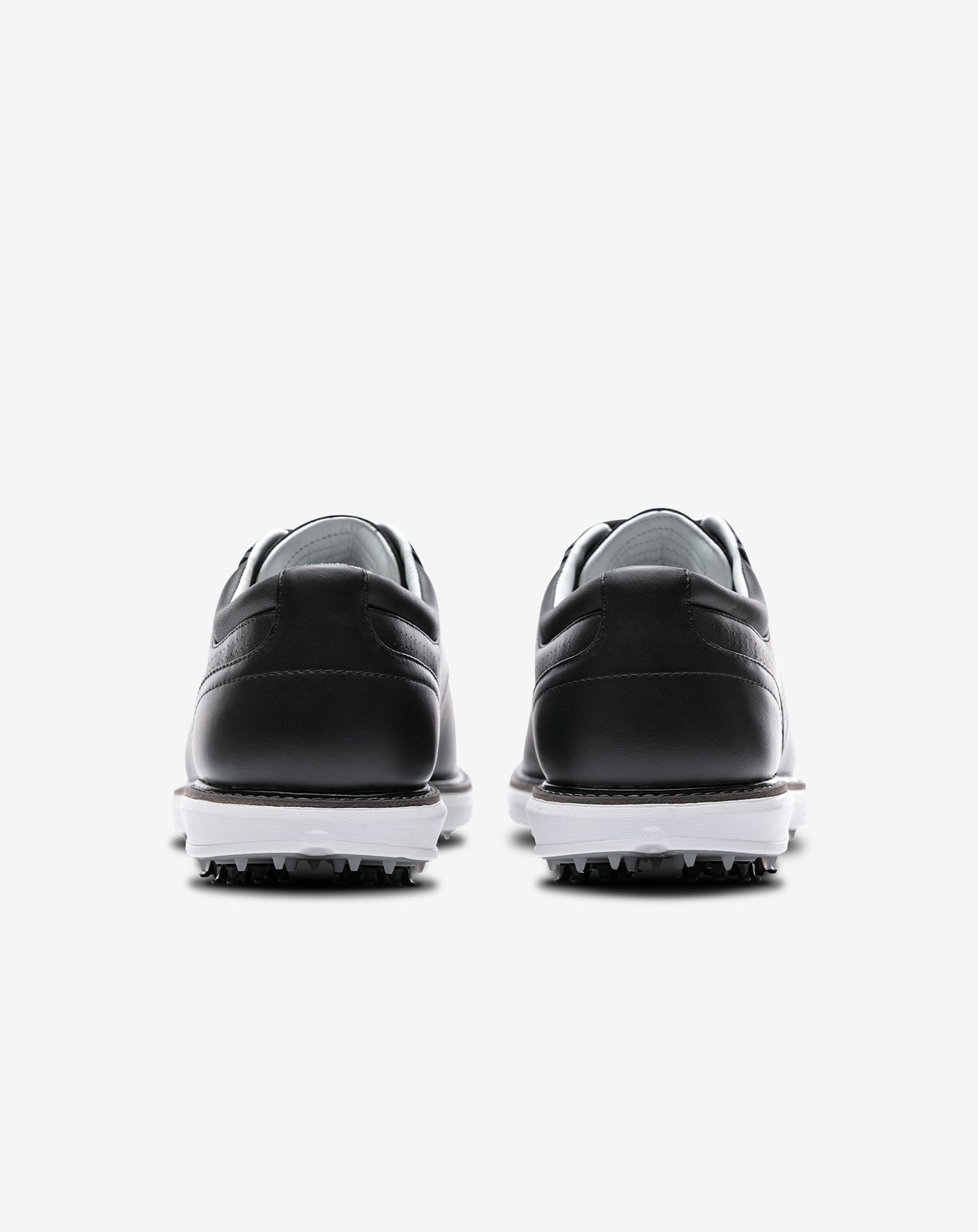 The Legend Spiked Golf Shoe ∣ TravisMathew